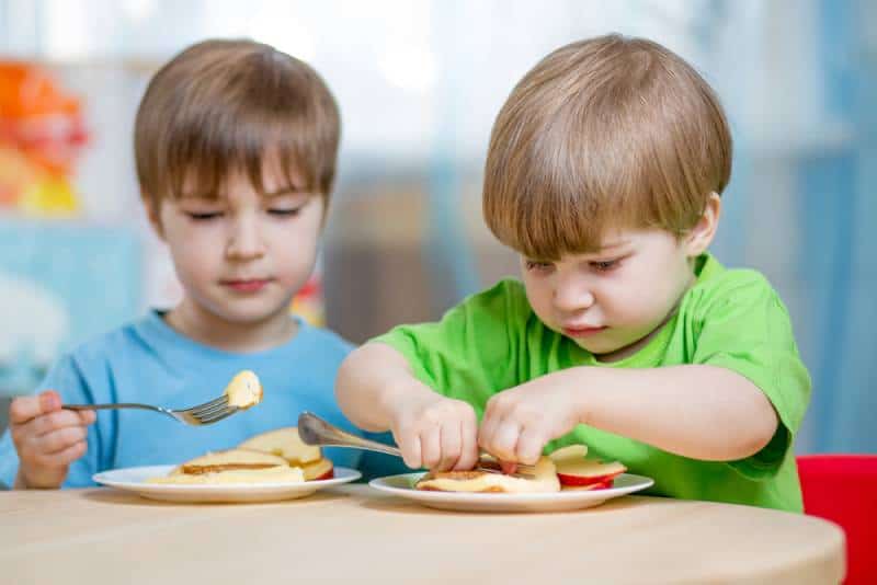 Kids eating healthy snack