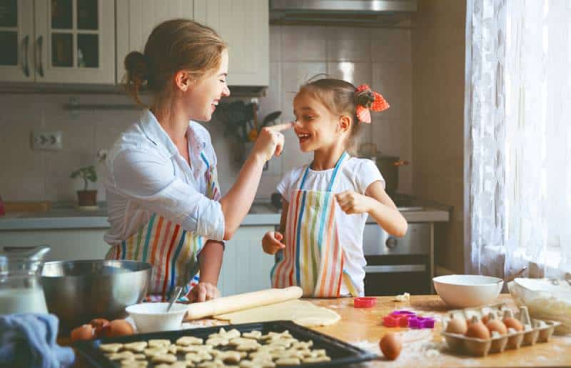 mother and child daughter baking