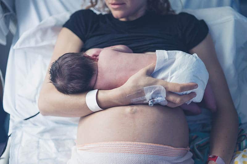 breastfeeding newborn first hour breast milk come in