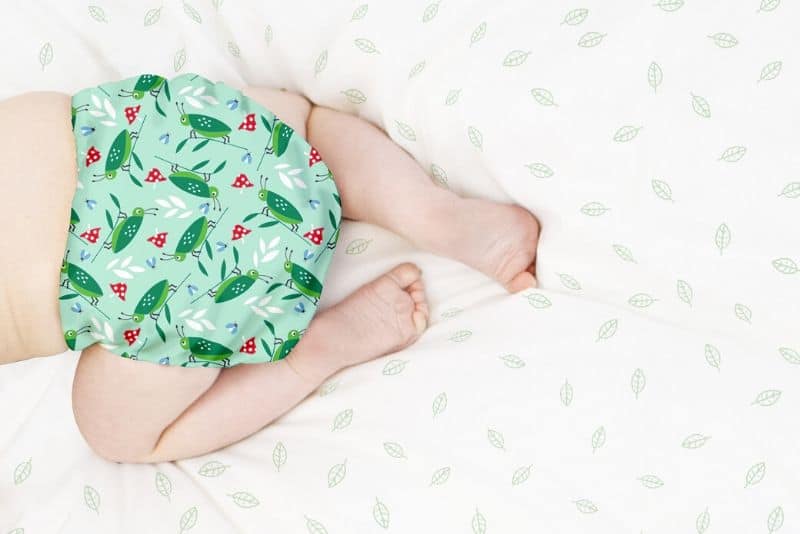Baby in colorful organic diapers