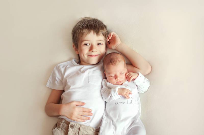 Boy with his baby brother