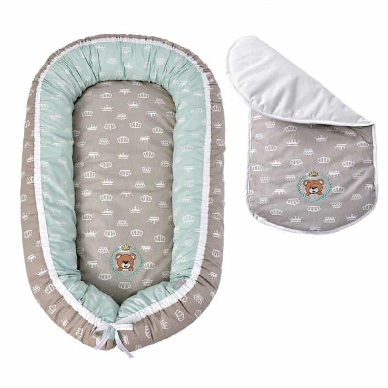 Cotton baby lounger with a slipcover on a white background