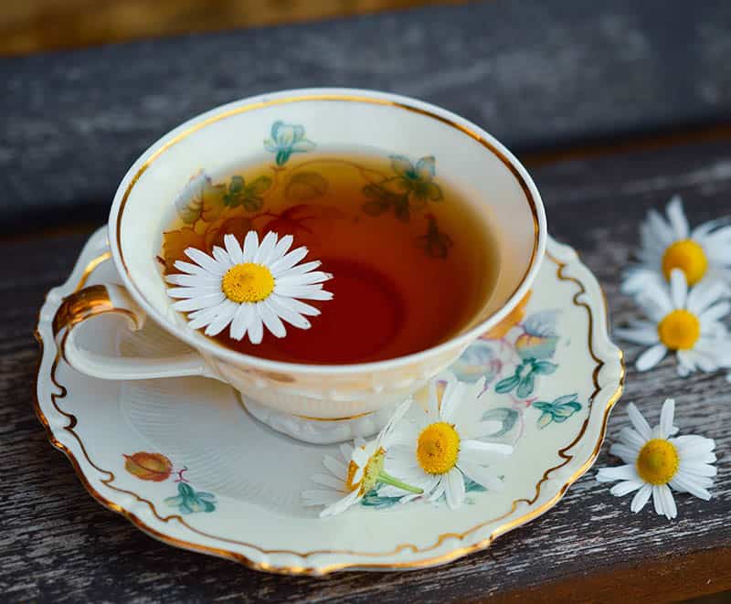 Chamomile tea in a beautiful cup