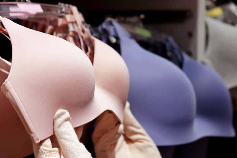 Woman buying a bra at the store