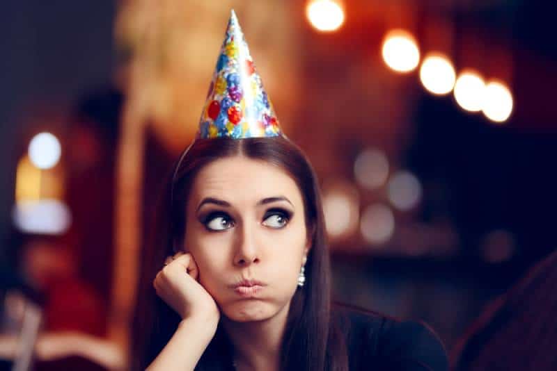 Bored woman doesn't want to attend the party