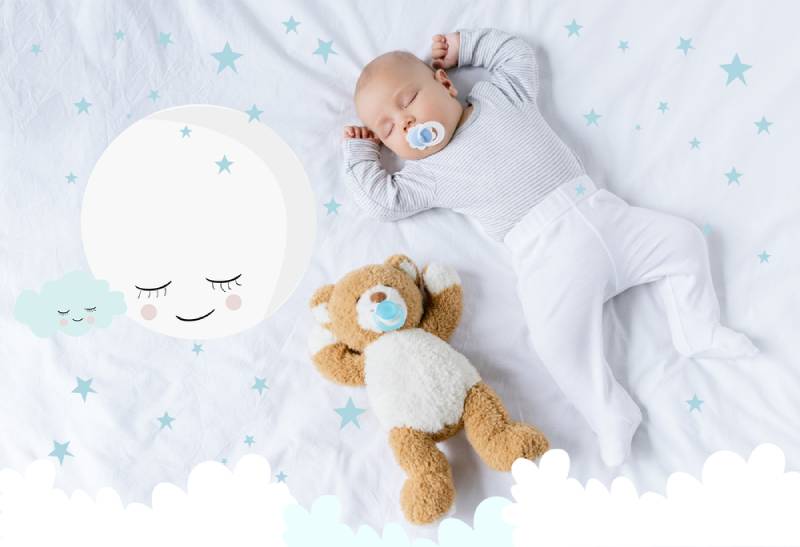 baby with pacifier sleeping on bed with teddy bear with cute moon illustration