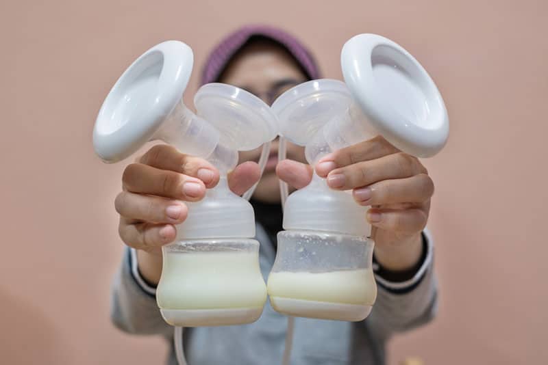 bottles of pumped breast milk