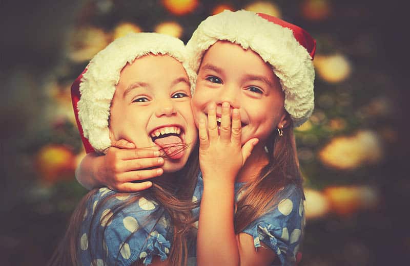 daughters laughing at jokes for christmas