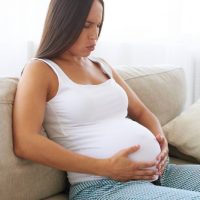 pregnant woman feeling pain