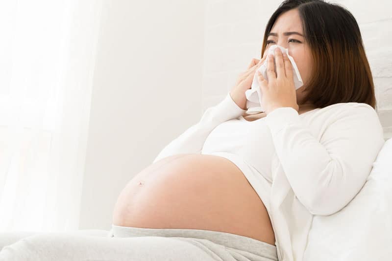 pregnant woman having a stuffy nose