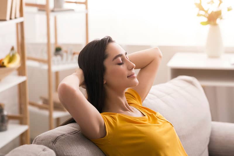 young woman relaxing on the couch 