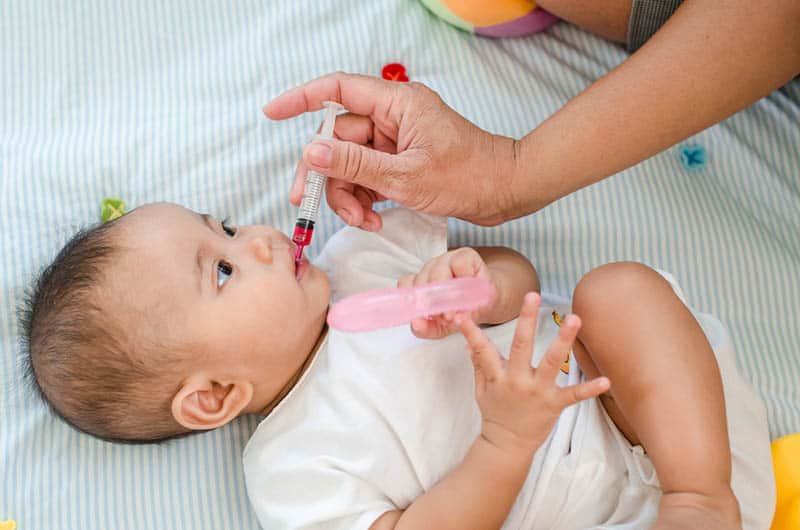 baby feeding with medicine