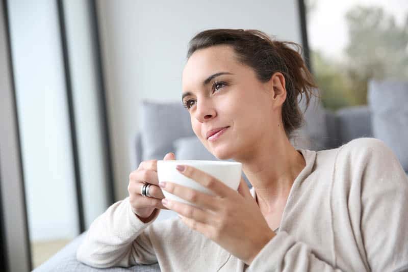 calm woman enjoying the coffee