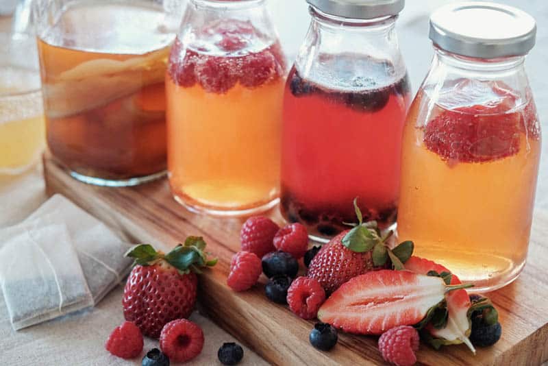 kombucha juices in the bottles with fruites