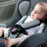 baby sleeping in the car seat
