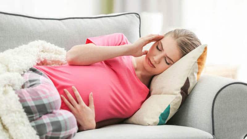 pregnant woman feeling pain in the head