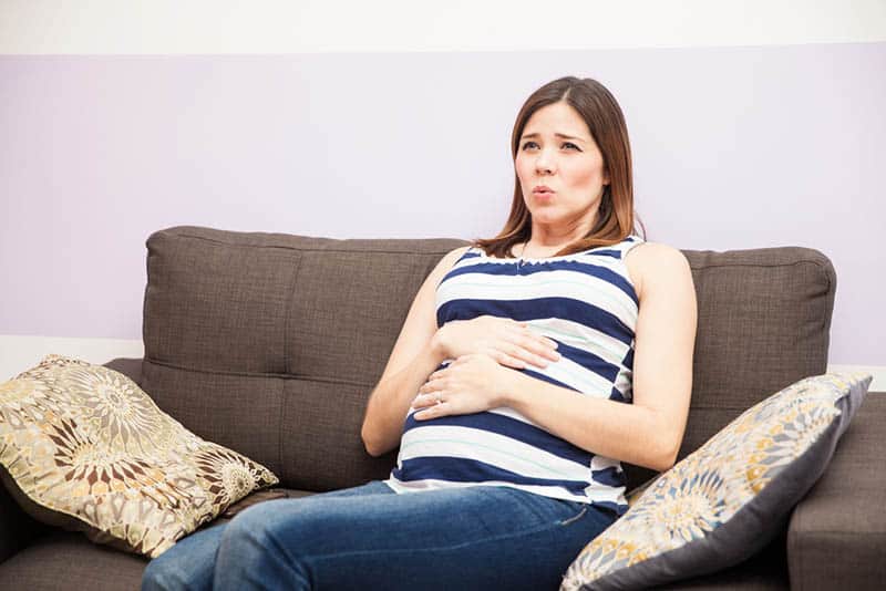 pregnant woman having a false contraction