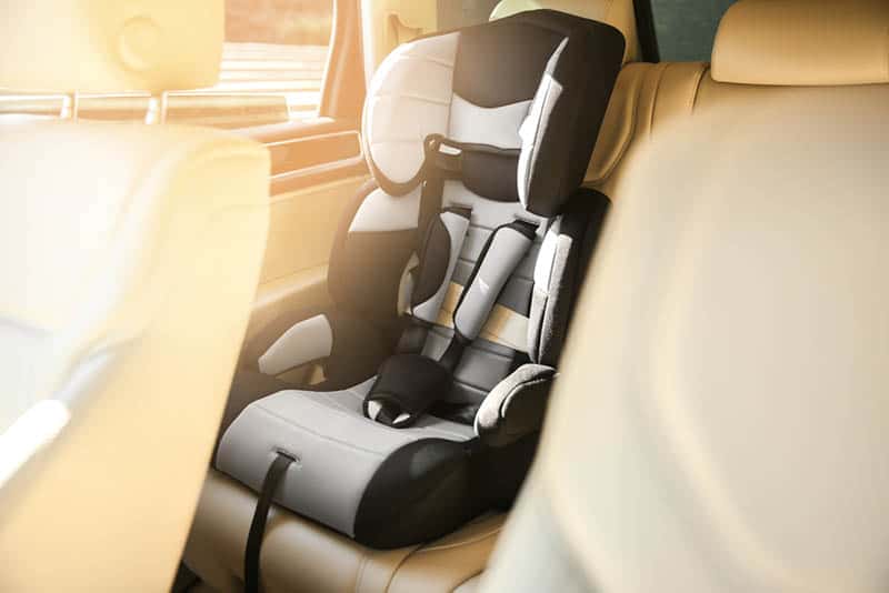 safety seat for baby installed in car 