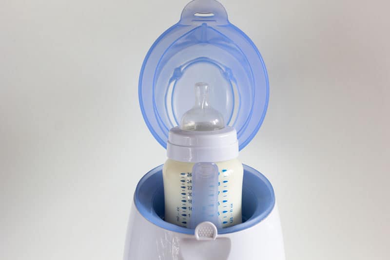 baby milk bottle in a warm heater