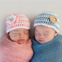 twin newborn babies sleeping