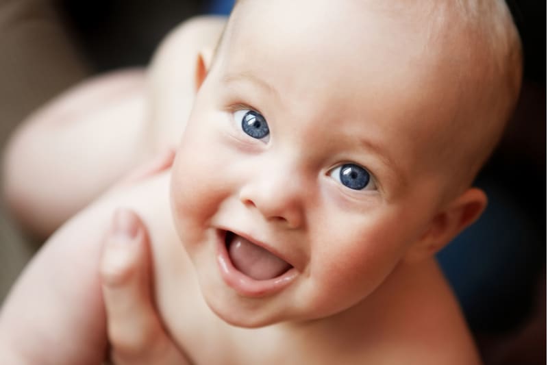 adorable smiling newborn baby