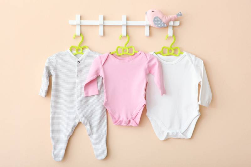 daycare clothing items on a hanger
