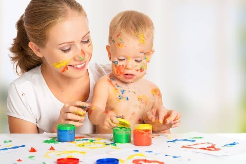 mother and baby finger painting