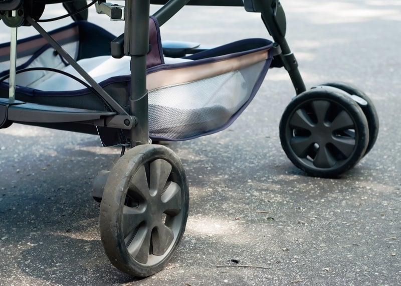 black wheels on a baby stroller