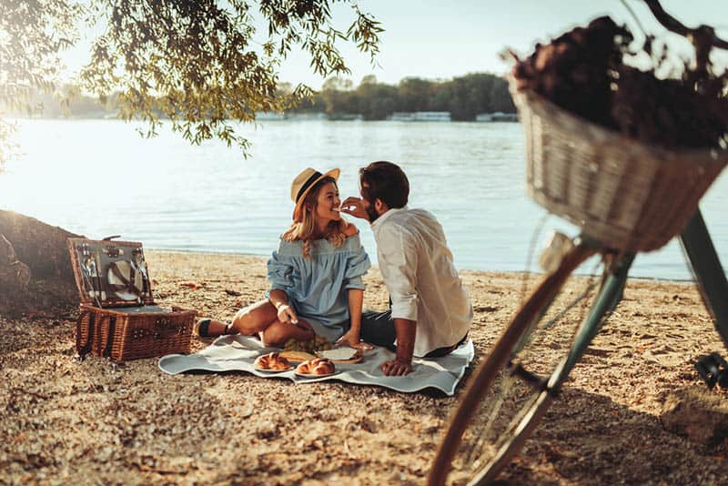 couple in love enjoying the picnic time