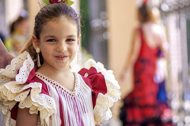  Little girl in flamenco style dress smiling