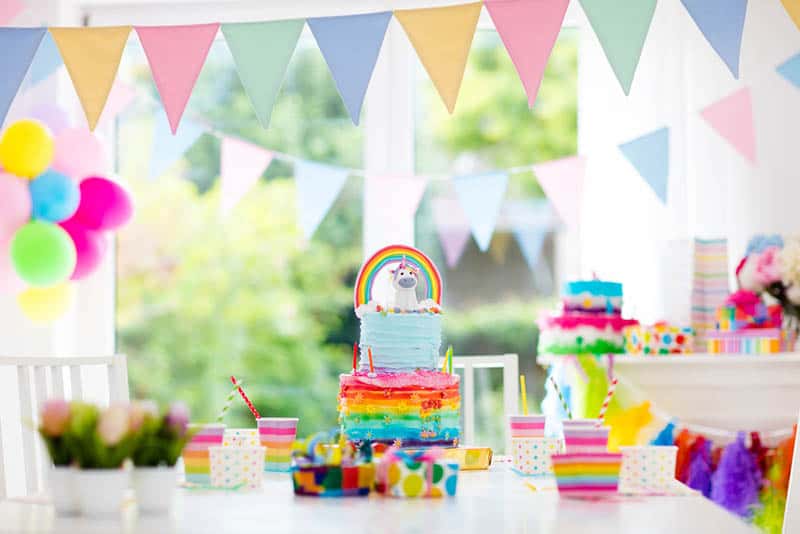 Room with festive balloons, colorful banners for a baby shower