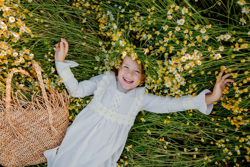 happy little girl in a cotton dress