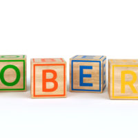 the name Robert spelled out with colorful wooden cubes