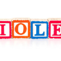 Toy blocks spelling out the name Violet