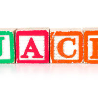 Toy blocks spelling out the name Jack