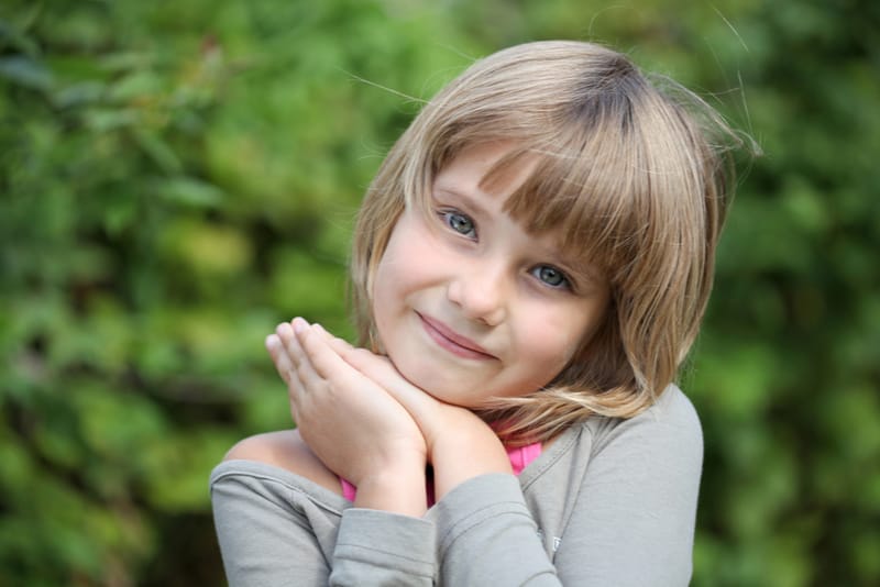 cute little girl with blond hair and blue eyes