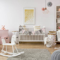 baby nursery decorated with beautiful furniture