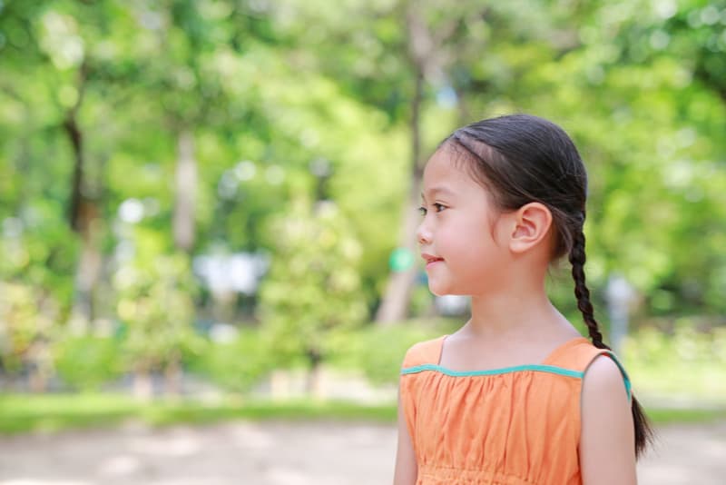 Smiling little child girl outdoors